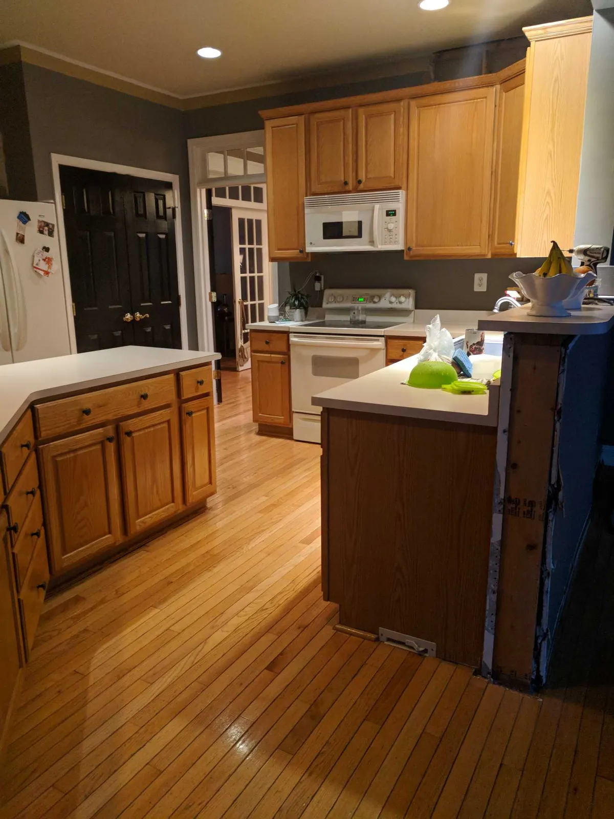 Golden oak, opened up in white — before Mac Kitchens' remodel