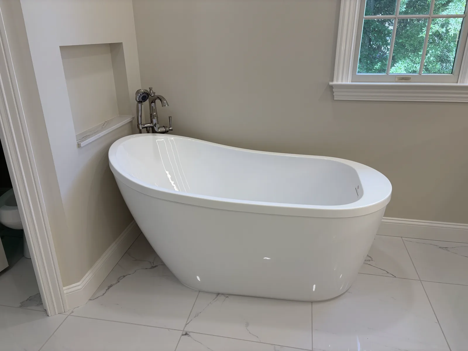 A dated bath, reimagined — the finished result by Mac Kitchens