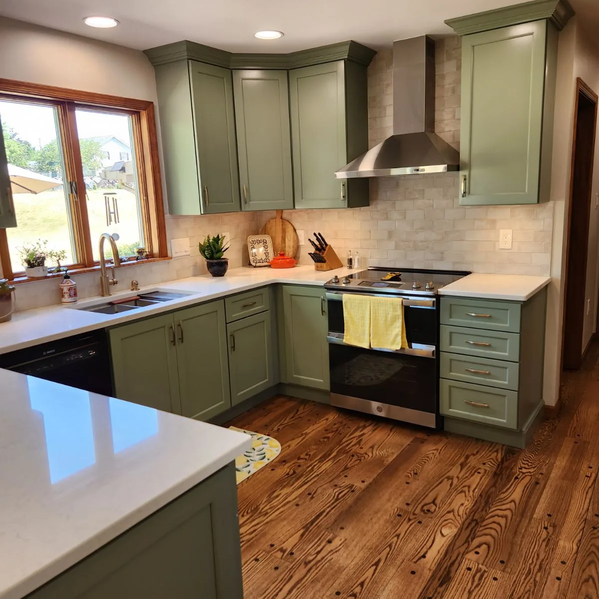 From oak and wallpaper to sage and stone — the finished result by Mac Kitchens